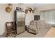 Inviting space adorned with trophies, featuring a comfortable chair and ample storage, suitable for a home office at 175 N Unity Grove Rd, Locust Grove, GA 30248