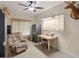 Cozy home office featuring a wooden desk, safe, and mounted wildlife trophies, perfect for a dedicated workspace at 175 N Unity Grove Rd, Locust Grove, GA 30248