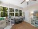 Bright sunroom with wood floors and lots of natural light at 175 N Unity Grove Rd, Locust Grove, GA 30248