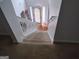 Clean staircase with white railings and carpeted steps leading to the upper level at 11950 Markham Way, Hampton, GA 30228