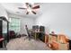 Bedroom with white walls, neutral carpet, a ceiling fan, and a window with blinds at 100 Gum Creek Landing, Oxford, GA 30054