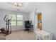 Sitting area with natural light and home office setup at 100 Gum Creek Landing, Oxford, GA 30054