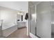 Main bathroom with a bathtub and shower stall at 100 Gum Creek Landing, Oxford, GA 30054