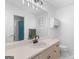 Bathroom with updated vanity, countertop, and lighting above a large mirror at 332 Judy Dr, Mcdonough, GA 30253