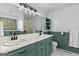 Bright bathroom featuring double sinks, modern fixtures, and ample counter space and storage at 332 Judy Dr, Mcdonough, GA 30253