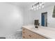 Well-lit bathroom with a large mirror and updated vanity with black hardware at 332 Judy Dr, Mcdonough, GA 30253