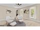 Inviting living room with neutral decor, plush seating, and lots of natural light from windows at 332 Judy Dr, Mcdonough, GA 30253