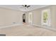 Spacious main bedroom featuring soft carpet, natural light, and ample space to relax at 332 Judy Dr, Mcdonough, GA 30253
