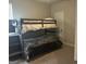 Cozy bedroom with bunk beds, carpet flooring, and ample natural light at 3970 Lagrone St, Powder Springs, GA 30127