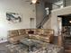 Comfortable living room boasts an oversized sectional sofa and stylish decor at 3970 Lagrone St, Powder Springs, GA 30127