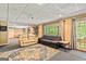The finished basement has a projector for movies and plenty of seating at 218 Woodruff Way, Peachtree City, GA 30269