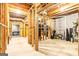 Unfinished basement with concrete floor, wood framing, and utility supplies at 218 Woodruff Way, Peachtree City, GA 30269