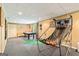 The finished basement has an arcade basketball game and pool table for entertaining guests at 218 Woodruff Way, Peachtree City, GA 30269