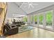 Spacious living room with fireplace and views of the deck at 218 Woodruff Way, Peachtree City, GA 30269