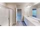 Bathroom with double vanity, shower, and tile flooring at 3 Roving Hills Cir, Cartersville, GA 30121