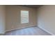 Neutral bedroom features carpet, a window with blinds, and gray ceiling at 3 Roving Hills Cir, Cartersville, GA 30121