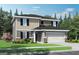 Charming two-story home with a well-manicured lawn, attached two-car garage, and a welcoming entrance at 3 Roving Hills Cir, Cartersville, GA 30121