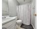 Bright bathroom with white vanity and patterned shower curtain at 105 Old Hickory Pointe, Mcdonough, GA 30252