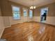 Open dining room featuring hard wood floors and natural light at 105 Old Hickory Pointe, Mcdonough, GA 30252