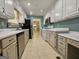Efficient kitchen with white cabinets and tile flooring at 105 Old Hickory Pointe, Mcdonough, GA 30252