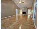 Open living room features a stone fireplace, hardwood floors, and vaulted ceilings at 105 Old Hickory Pointe, Mcdonough, GA 30252