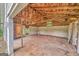 Unfinished outbuilding offers ample space for storage at 1128 Milstead Ne Ave, Conyers, GA 30012