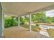 The porch offers plenty of space with white columns and wooden floor at 1128 Milstead Ne Ave, Conyers, GA 30012