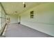 Large sunroom featuring tile floors and neutral paint at 1128 Milstead Ne Ave, Conyers, GA 30012
