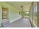 Relaxing sunroom filled with windows and natural light at 1128 Milstead Ne Ave, Conyers, GA 30012