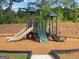Modern playground with slides and climbing structures on a wood chip surface at 2358 Argento Cir, Dacula, GA 30019