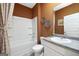 Clean bathroom featuring a shower-tub combo, neutral walls, and essential fixtures at 560 Whitman Ln # 2016, Stockbridge, GA 30281