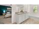 Bright bathroom with double vanity, soaking tub, and modern fixtures, adjacent to a bedroom at 560 Whitman Ln # 2016, Stockbridge, GA 30281