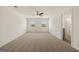 Bright bedroom with carpet flooring and natural light from the two windows, plus ceiling fan at 560 Whitman Ln # 2016, Stockbridge, GA 30281