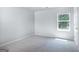 A comfortable bedroom featuring soft carpet, a window and a closet at 560 Whitman Ln # 2016, Stockbridge, GA 30281