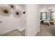 A bedroom featuring a walk-in closet and ceiling fan, with views to the outside at 560 Whitman Ln # 2016, Stockbridge, GA 30281