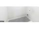 A simple laundry room with tile flooring and essential connections at 560 Whitman Ln # 2016, Stockbridge, GA 30281