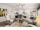 Spacious living room with an open layout, flowing into the kitchen and dining areas for easy entertaining at 560 Whitman Ln # 2016, Stockbridge, GA 30281