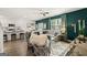 Open-concept living room with modern furnishings, a cozy sofa, and an adjacent kitchen area at 560 Whitman Ln # 2016, Stockbridge, GA 30281