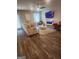 Inviting living room with stylish seating, fireplace, modern fixtures, and warm wood-look flooring at 4839 Station Lane # 25, Union City, GA 30349