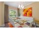 Bright dining room with hardwood floors, chandelier, seating for 8 and large windows overlooking the treelined yard at 3192 Paces Mill Se Rd, Atlanta, GA 30339