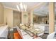 Beautiful dining room featuring a modern chandelier, hardwood floors, seating for 8 and great natural light at 3192 Paces Mill Se Rd, Atlanta, GA 30339
