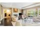 Bright living room featuring a fireplace, hardwood floors, recessed lighting, and a comfortable seating arrangement at 3192 Paces Mill Se Rd, Atlanta, GA 30339