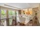 Elegant living room featuring hardwood floors, recessed lighting, large windows and a comfortable seating arrangement at 3192 Paces Mill Se Rd, Atlanta, GA 30339