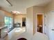 Bright kitchen provides convenient access to dining area, powder room and backyard at 3838 Kirkwood Nw Run, Kennesaw, GA 30144