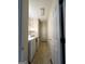 This utility laundry room features a washer, dryer, and convenient storage shelves at 3838 Kirkwood Nw Run, Kennesaw, GA 30144
