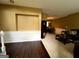 Open living spaces showcasing a combination of carpeted and hardwood floors at 3838 Kirkwood Nw Run, Kennesaw, GA 30144