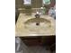 Vintage bathroom sink with faux marble counter, old fixtures and dated cabinetry at 603 New Hope Rd, Fayetteville, GA 30214