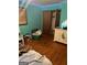 View of a bedroom with a bed, dresser, and window at 603 New Hope Rd, Fayetteville, GA 30214