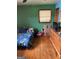Bedroom with hardwood floors and natural light at 603 New Hope Rd, Fayetteville, GA 30214