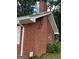 Brick house with a brick chimney at 603 New Hope Rd, Fayetteville, GA 30214